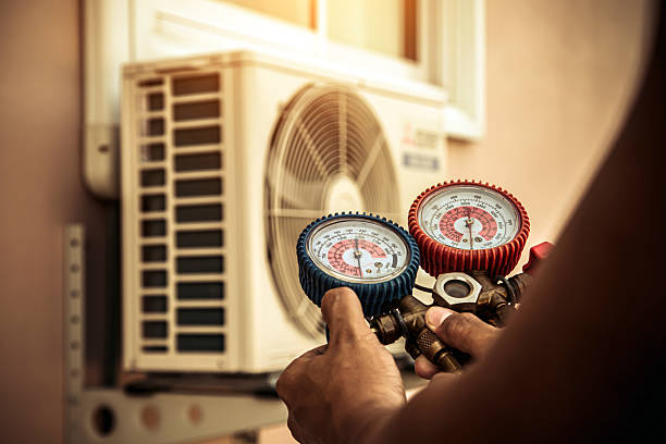 Professional Hvac technician working in Minden, NE